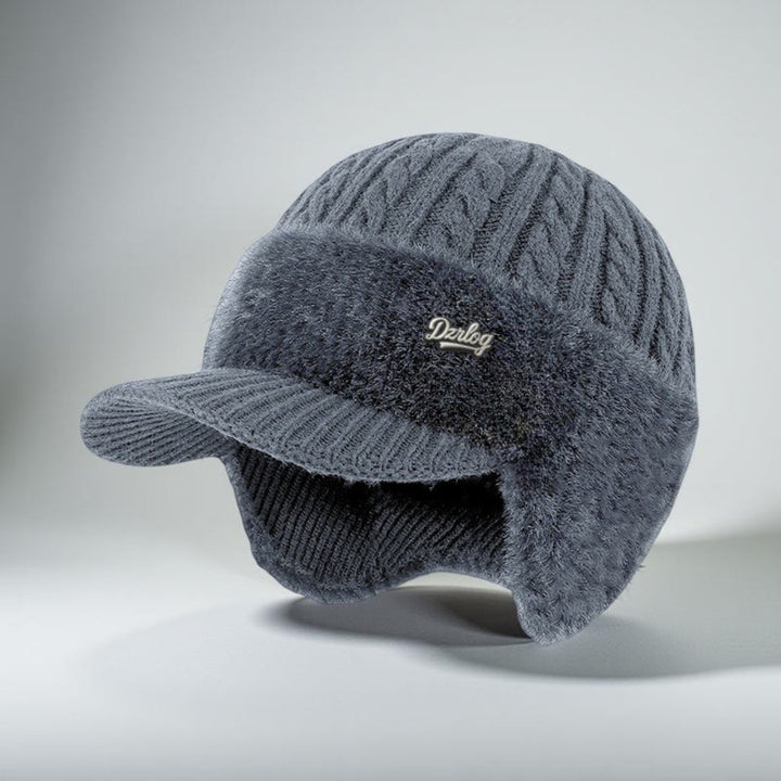 Protector gorro trapper unisex de invierno con orejeras y visera, ideal para nieve y temperaturas frías.