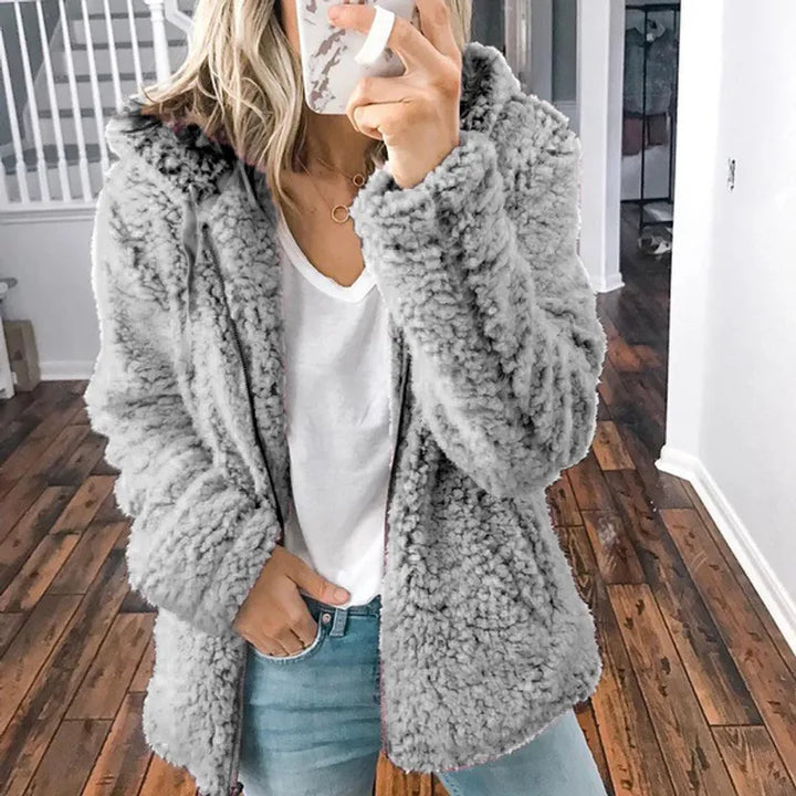 Chaqueta de invierno cálida para mujer con cremallera, diseño funcional y elegante, con capucha.