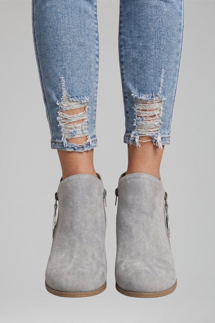 Botines femeninos clásicos con cremallera lateral, moda cómoda y versátil para cualquier ocasión.