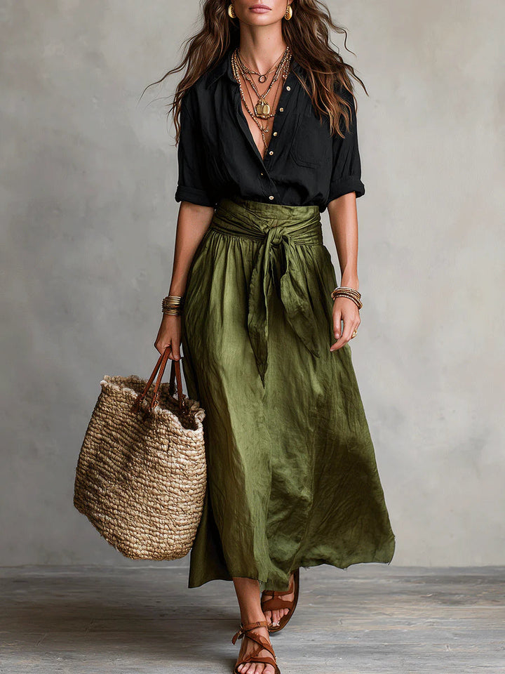 Conjunto de mujer: camiseta negra básica y falda midi verde olivo. Outfit elegante y casual para verano.