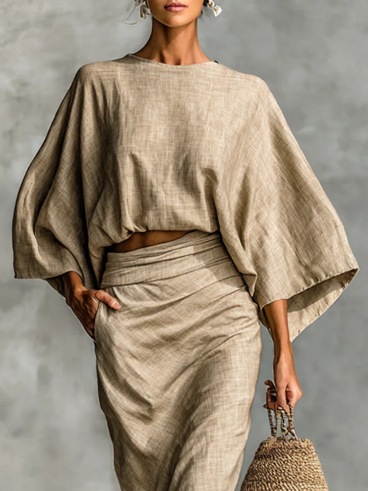 Conjunto de dos piezas para mujer: falda larga fluida y blusa elegante. Vestuario moderno y cómodo.