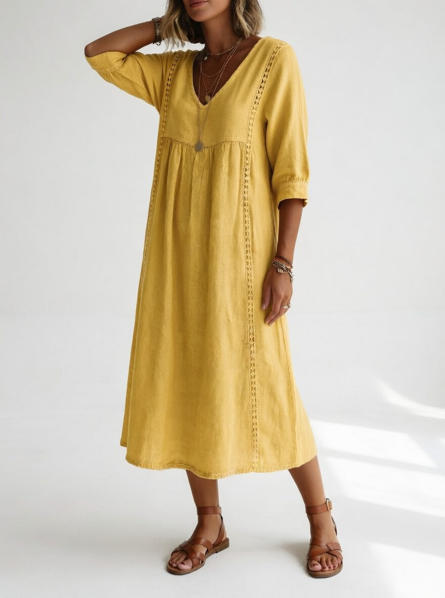 Detalle de tejido fluido de vestido midi para mujer, resalta comodidad y estilo versátil.