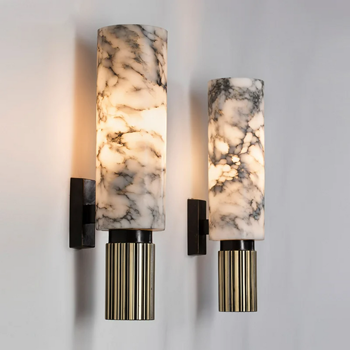 Lámpara de pared LED con sofisticado diseño cilíndrico y acabado en efecto mármol para hogares.