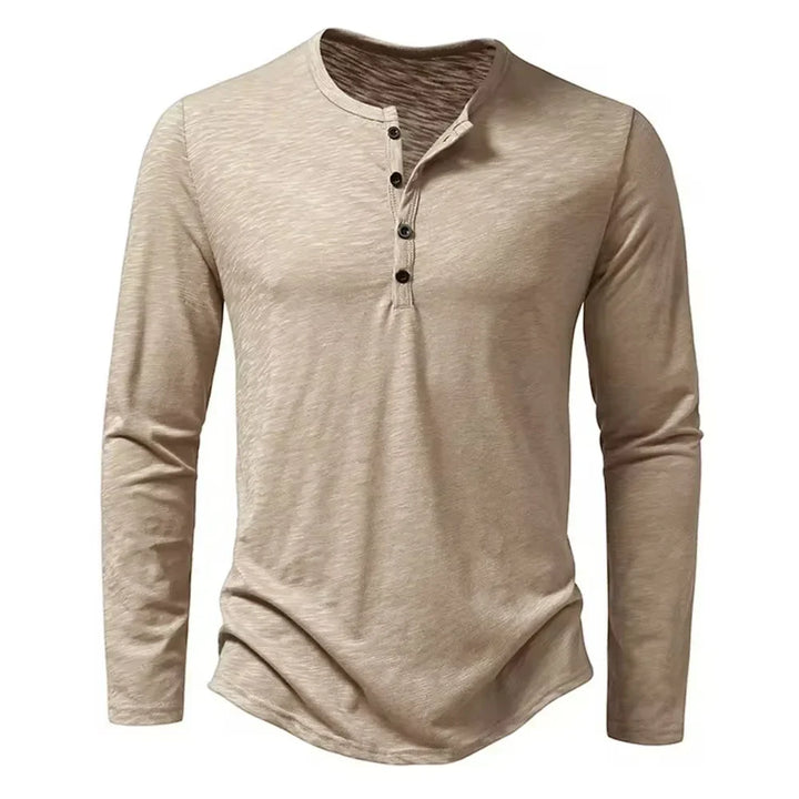 Camiseta manga larga hombre, tejido de algodón transpirable. Diseño con escote de botones, perfecta para capas.
