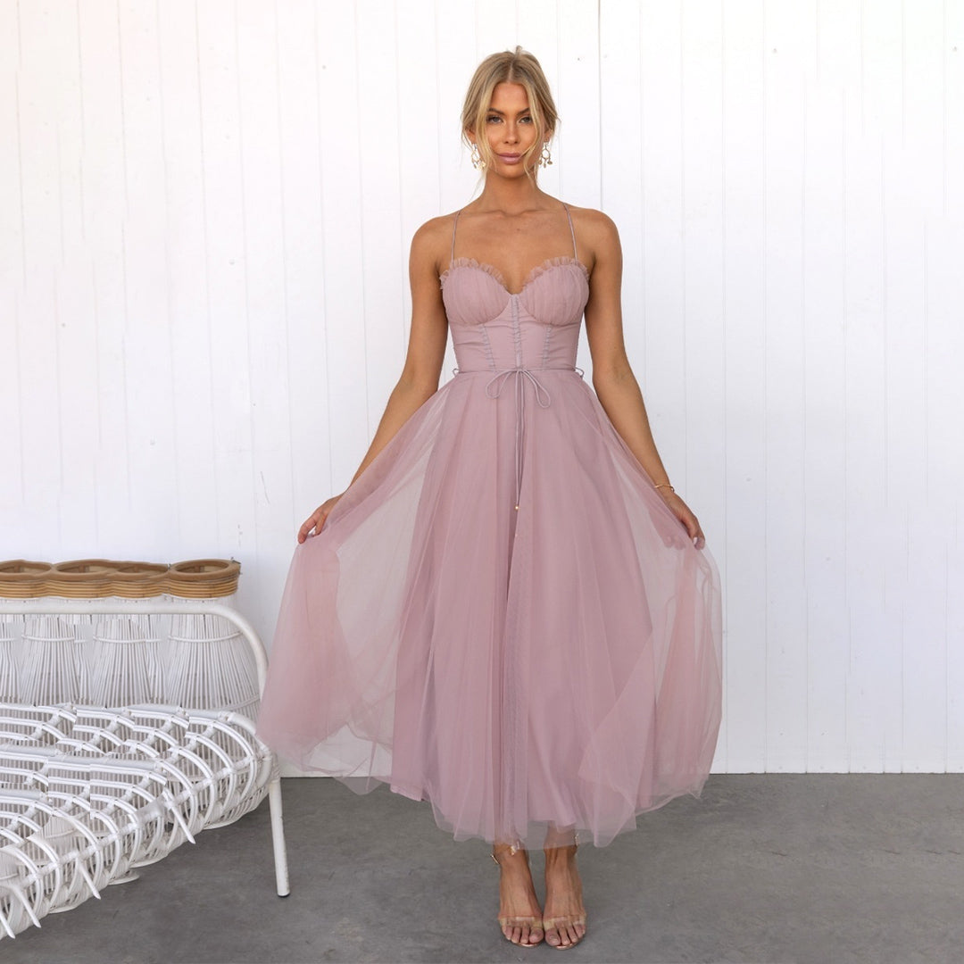 Vestido midi formal de mujer. Ideal para galas, fiestas y cenas elegantes. Disponible en varios colores de moda.