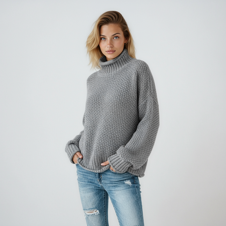 Ropa femenina de invierno: jersey de mujer con cuello alto, suéter de manga larga que aporta calidez.
