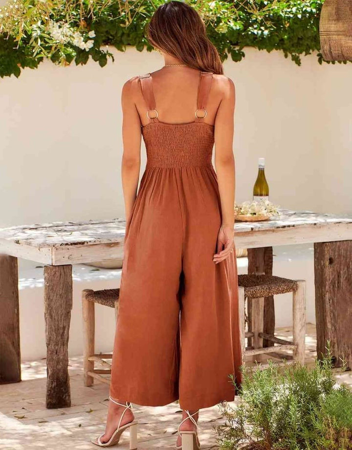 Mono elegante sin mangas, escote V, pernera ancha. Para bodas, graduaciones y eventos especiales.