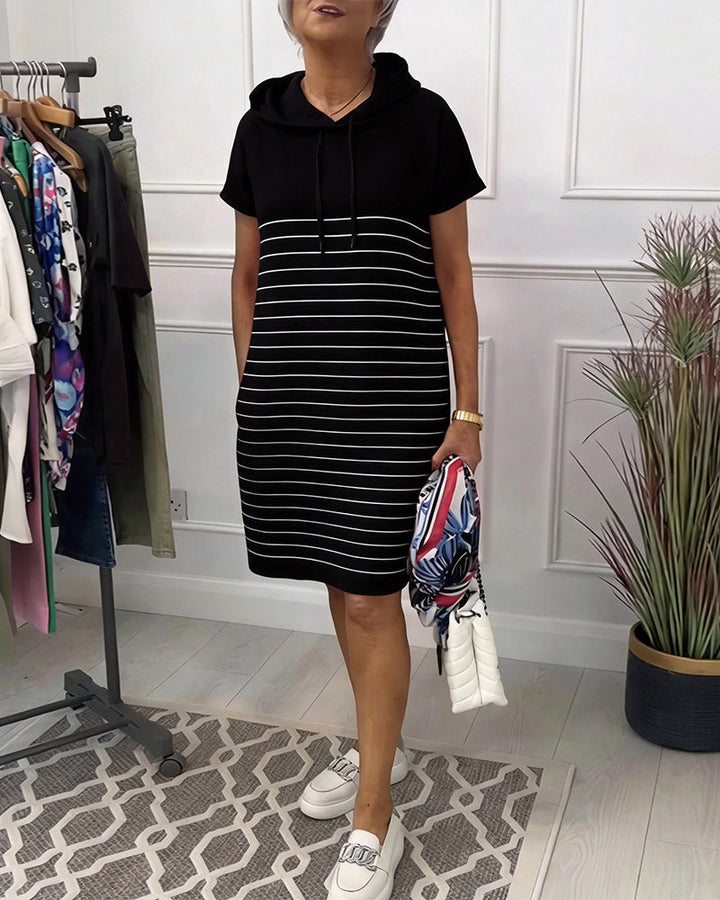 Vestido casual de mujer con capucha y rayas negras, ideal para un estilo moderno y cómodo y ropa urbana.