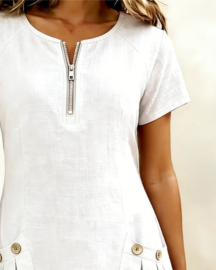 Comodidad y estilo: vestido corto para mujer con bolsillos y cuello con cremallera.
