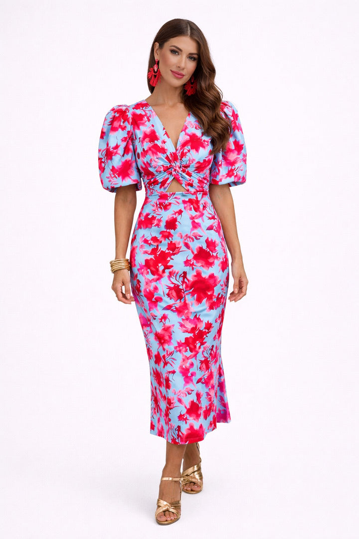 Vestido midi mujer con mangas abullonadas prominentes y detalle calado en la cintura, moda femenina elegante.