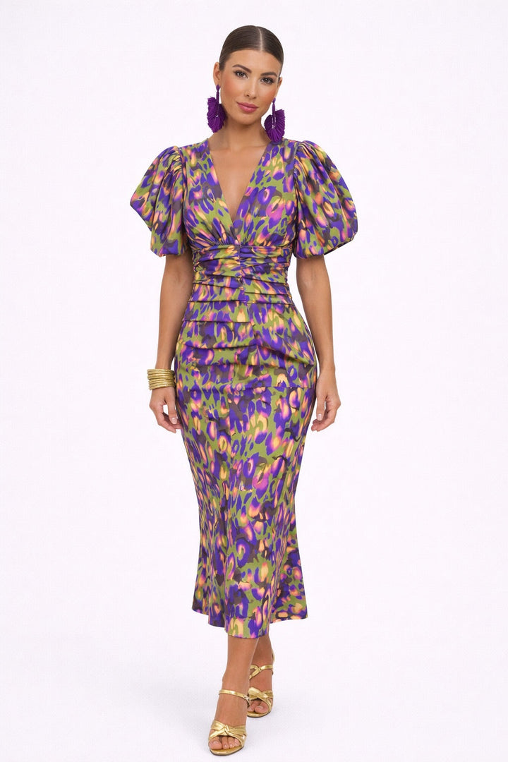 Vestido midi elegante y versátil para mujer, con estilo y mangas abullonadas. Perfecto para eventos o look casual de verano.