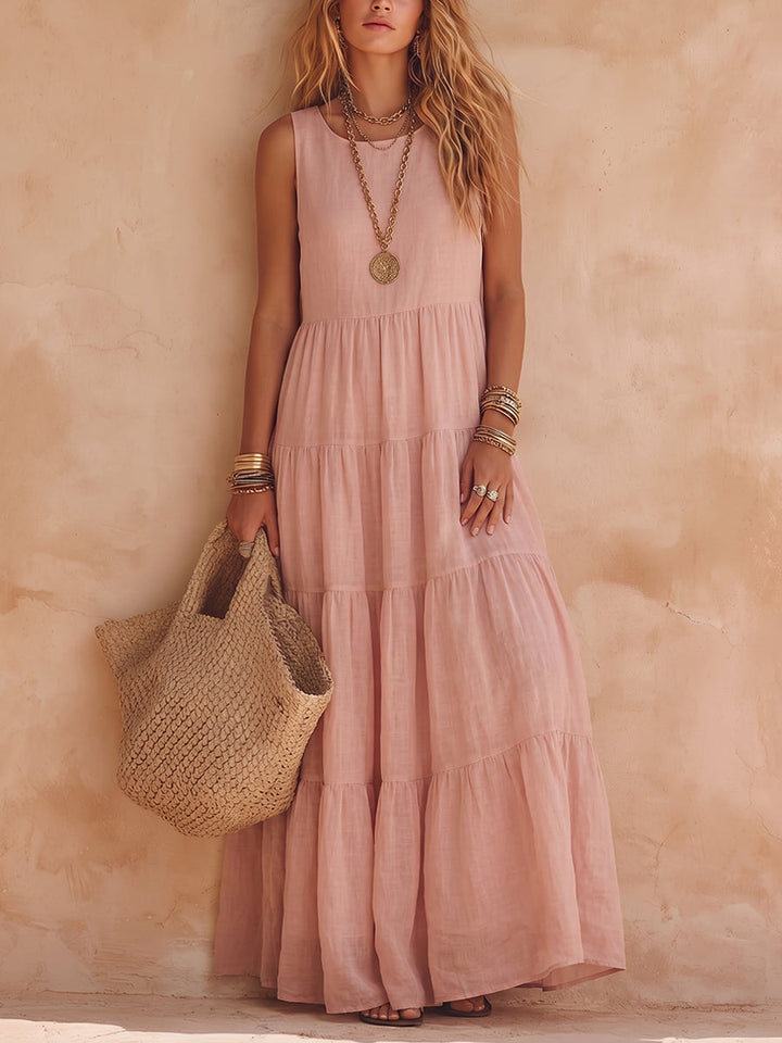 Vestido largo de mujer rosa pálido de algodón y lino, sin mangas y corte fluido, ideal para verano casual o playa.