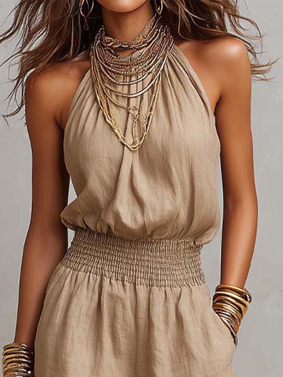 Mono mujer elegante halter, pierna ancha, espalda descubierta. Ideal para ocasiones especiales de verano.
