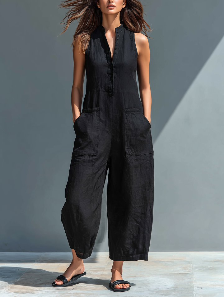 Mono de lino minimalista para mujer, sin mangas y cuello alto, ideal para verano casual elegante.