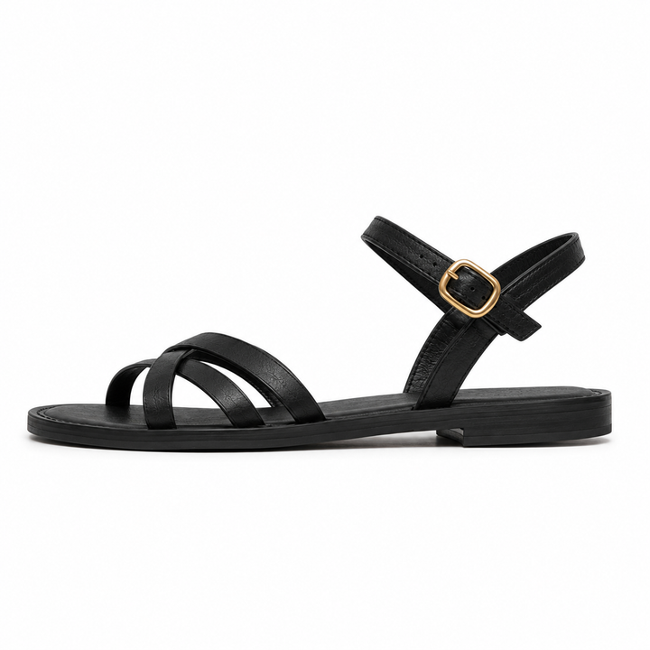 Elegantes sandalias negras de mujer con tiras cruzadas, perfectas para un confort diario y estilo casual de verano.