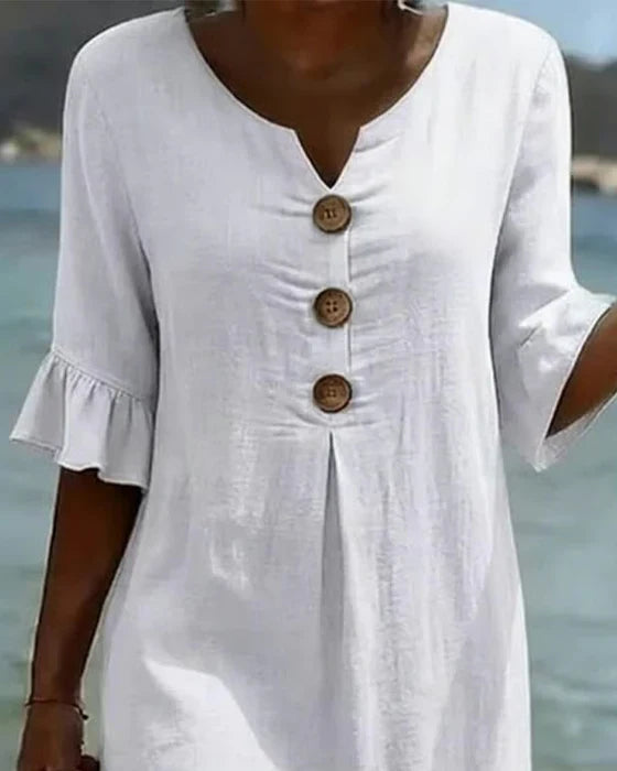 Vestido boho de mujer, algodón y lino, con mangas abullonadas. Estilo fresco para playa o casual de verano.