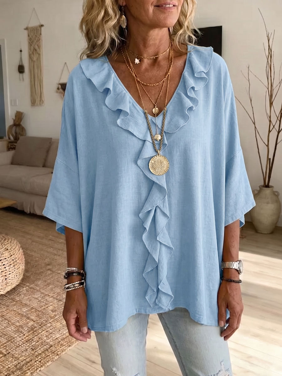 Blusa de mujer suelta de algodón y lino con volantes y escote en V. Ideal para un look fresco de verano.
