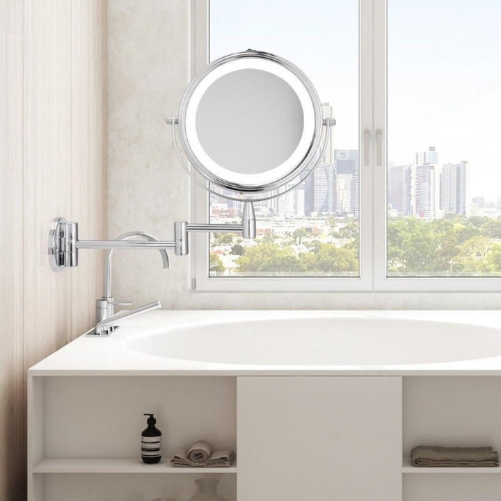 Espejo LED de baño ajustable con brazo dual y aumento para maquillaje y cuidado facial.