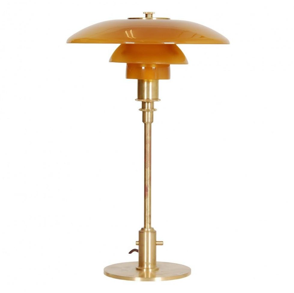 Lámpara de escritorio Art Déco. Diseño geométrico de cobre, ideal para una iluminación elegante y moderna.