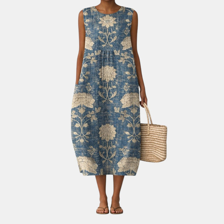 Vestido floral midi sin mangas para mujer. Prenda cómoda y casual, perfecta para el día a día y moda de verano.
