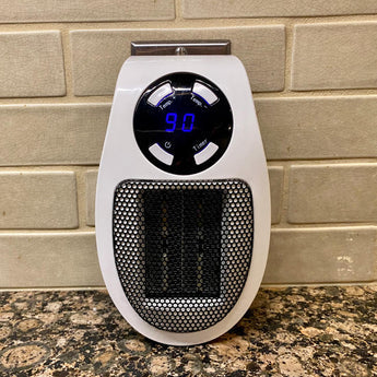 Calentador de espacio Top Heat en oficina, proporcionando calor rápido y silencioso para un ambiente de trabajo cálido.