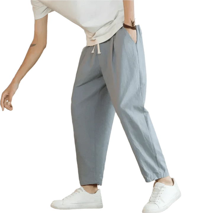 Pantalón de algodón versátil para hombre, tejido transpirable, ideal para look casual de primavera-verano.