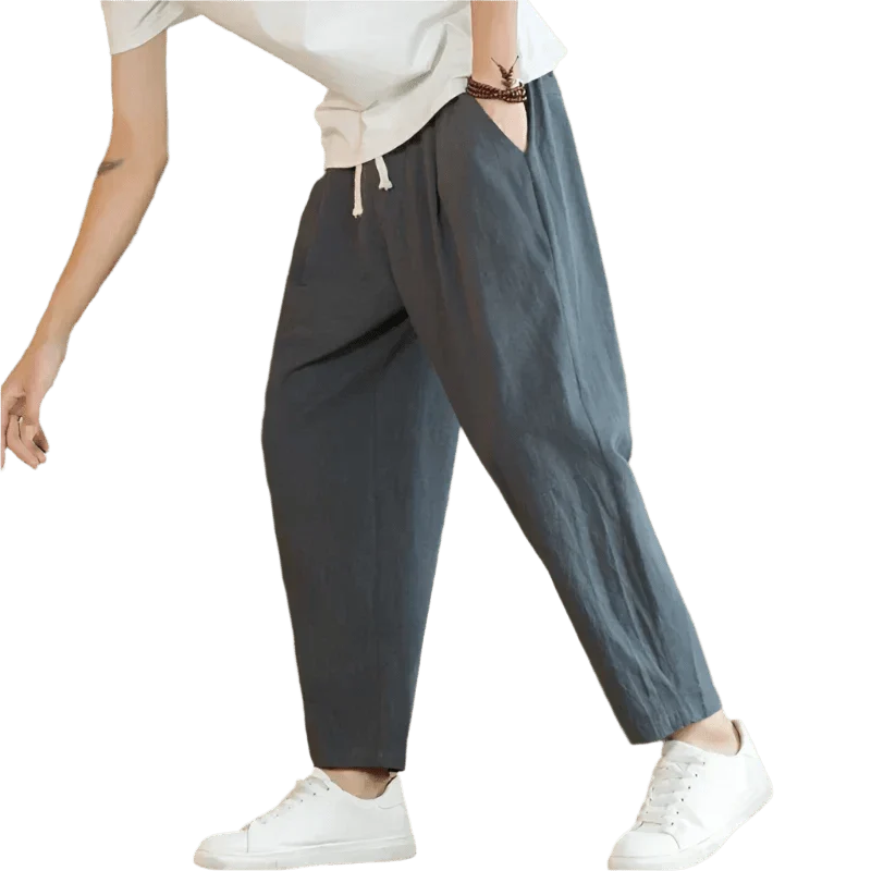 Pantalón casual de algodón para hombre, cómodo y versátil, con un estilo relajado y ajuste ligero.