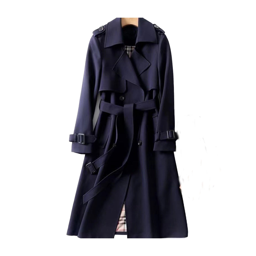 Abrigo trench elegante para mujer, con cinturón que estiliza la figura. Prenda chic para otoño-primavera.