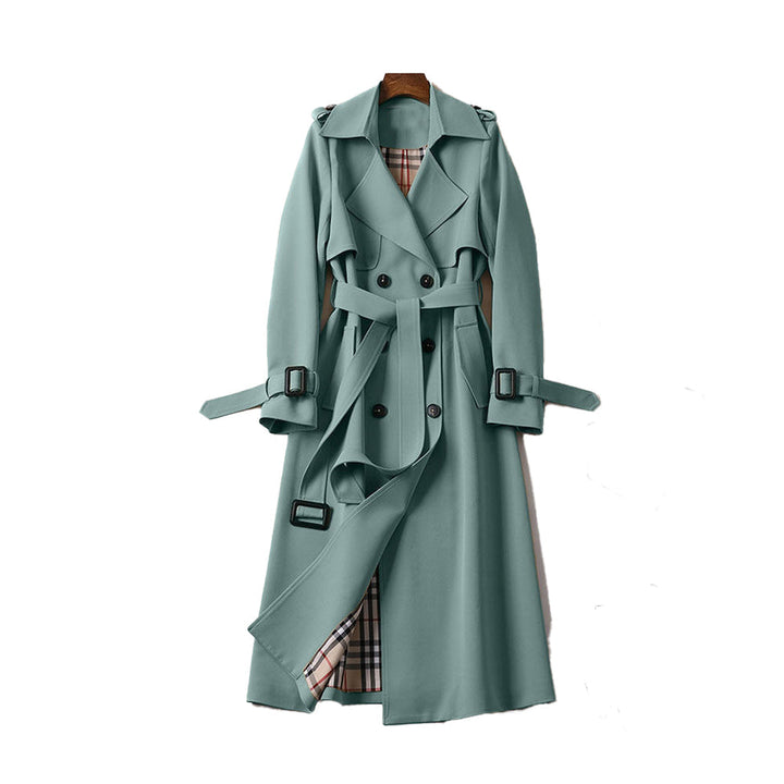 Trench coat largo para mujer, con cinturón y botones frontales. Añade sofisticación a tu atuendo.