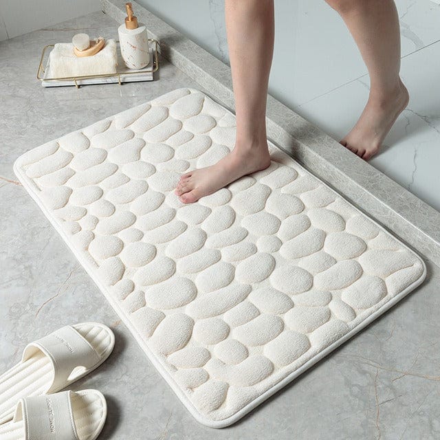 Alfombrilla antideslizante gris para ducha, garantiza seguridad y confort en el baño moderno.