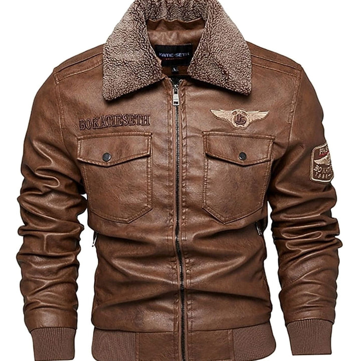 Cazadora bomber aviador hombre negra con cuello sherpa y mangas de polipiel. Ideal para invierno y otoño.