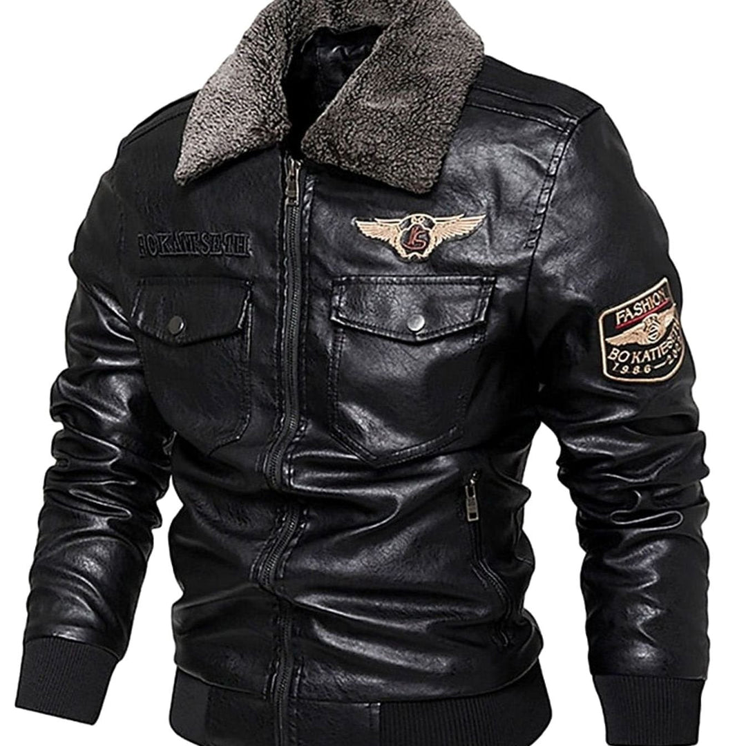 Cazadora aviador hombre moderna con acabado de polipiel y cuello de borrego sintético. Estilo militar casual.