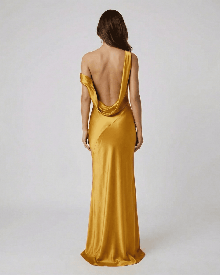 Vestido de noche blanco elegante para mujer, corte maxi y sin espalda. Perfecto para ocasiones formales y fiestas.