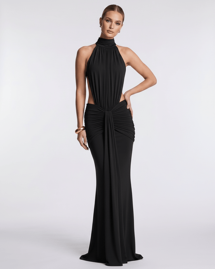 Vestido elegante sin mangas, espalda abierta, cuello halter, silueta ajustada y largo maxi.