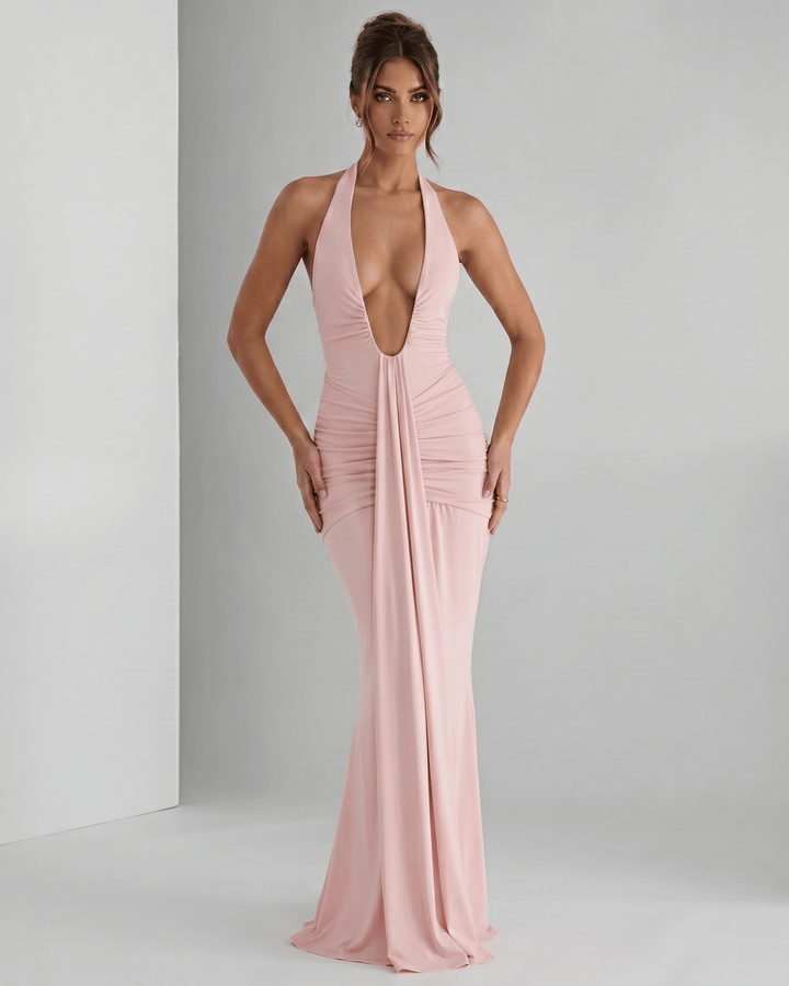 Vestido de invitada de boda, cuello halter, espalda descubierta, muy elegante.