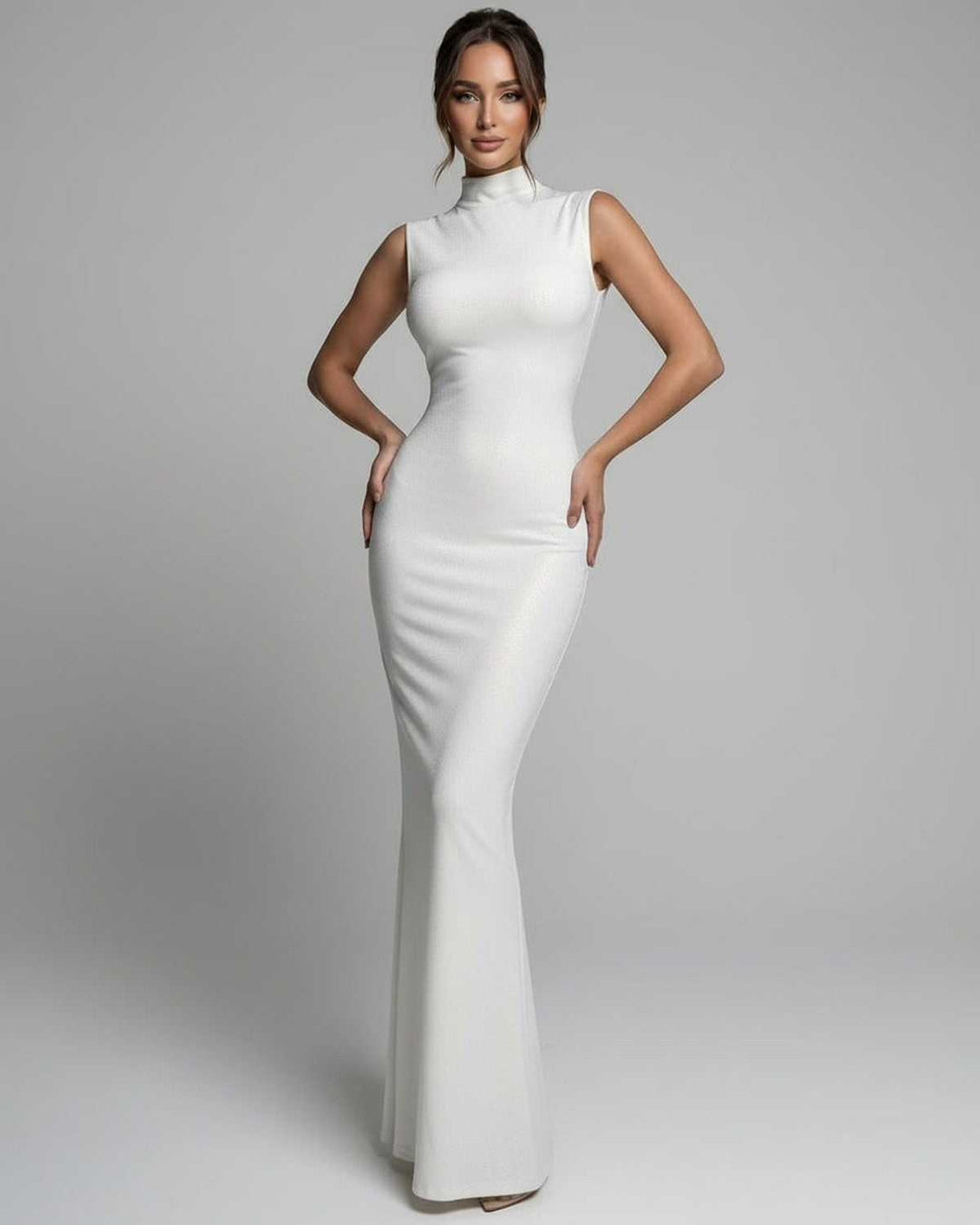 Vestido maxi Aurelia blanco, sin mangas, cuello alto, ideal para fiestas y ocasiones especiales.
