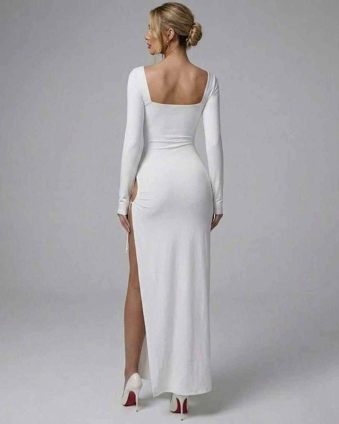 Vestido largo blanco de manga larga para mujer, sofisticado y moderno, perfecto para noche.