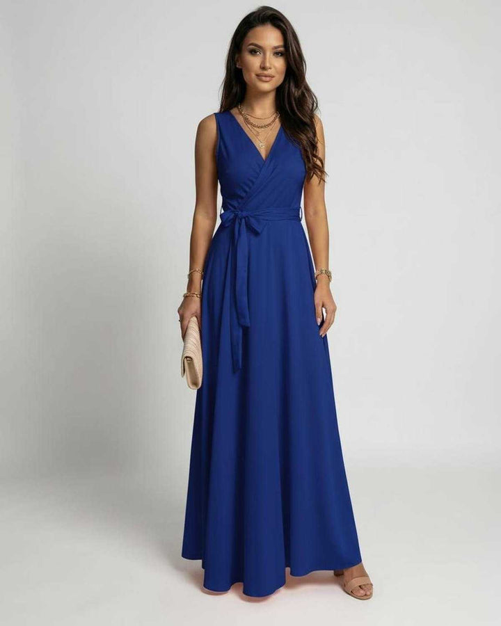 Vestido maxi azul elegante para mujer, ideal para fiesta o noche. Diseño fluido y atemporal con escote en V.