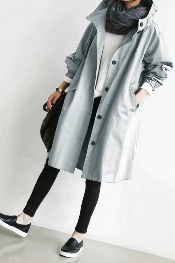 Trench coat impermeable de mujer, versátil para cualquier outfit de otoño o primavera, con estilo chic.