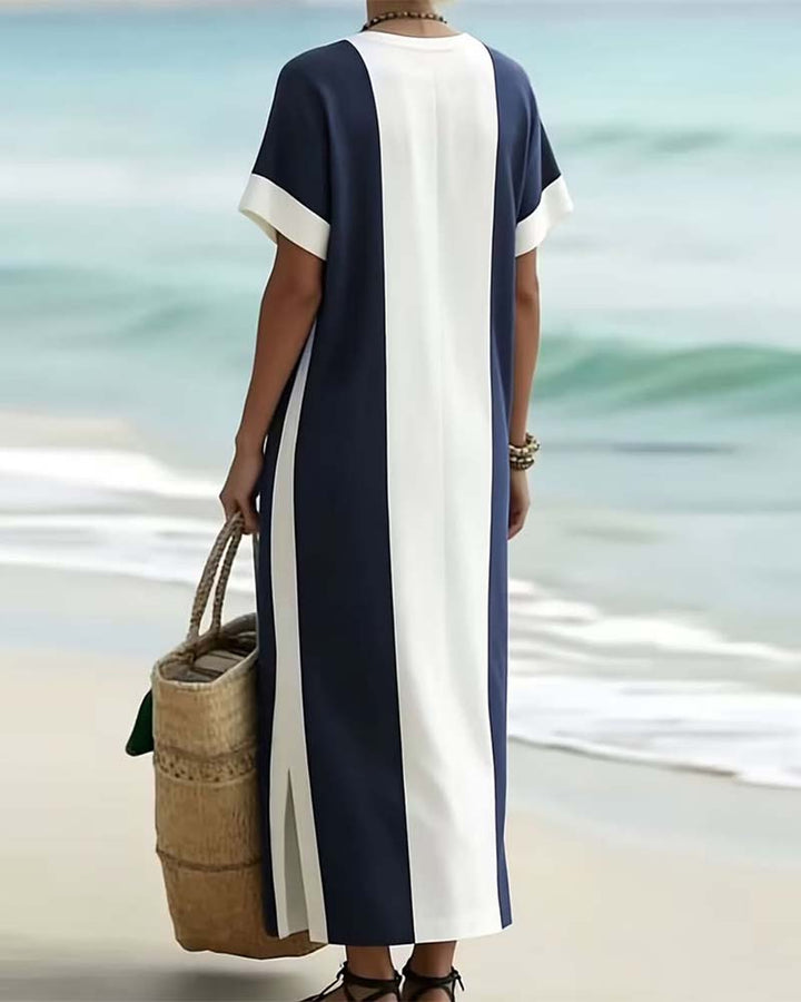 Vestido midi azul marino de rayas para mujer, fluido y cómodo, ideal para verano y look casual.