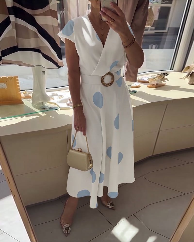Vestido casual midi de lunares para mujer con escote en V, estilo fresco y primaveral.