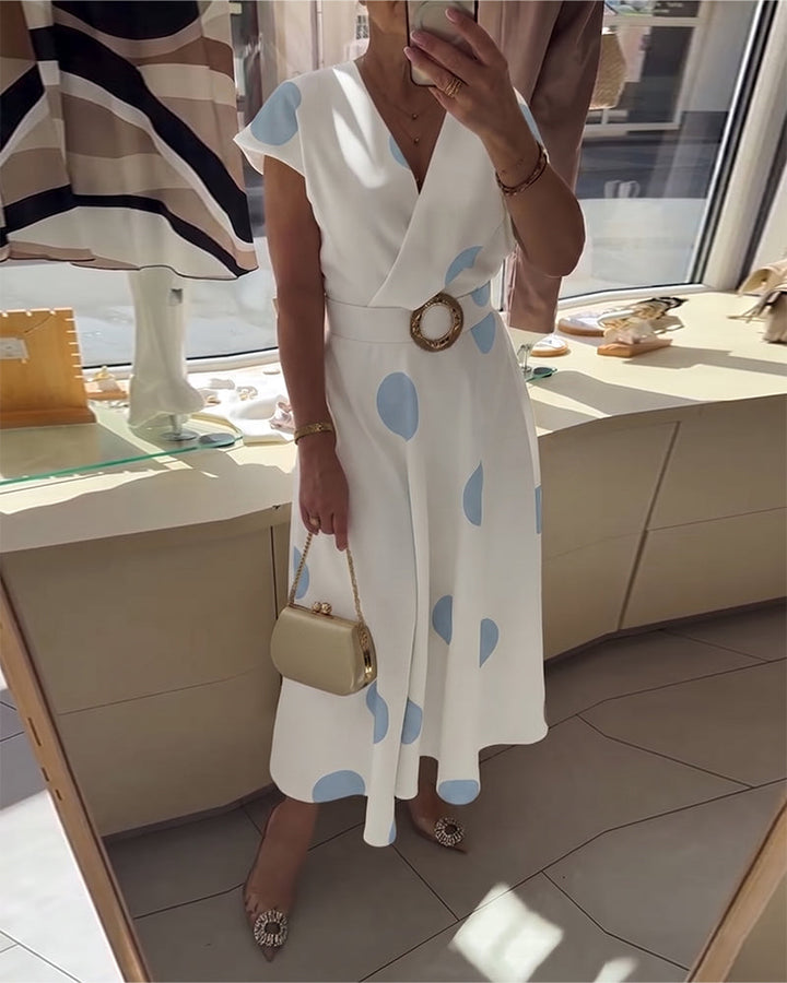 Vestido casual midi de lunares para mujer con escote en V, estilo fresco y primaveral.