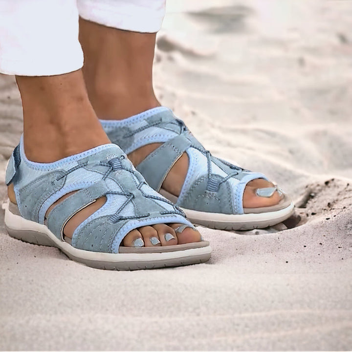 Elegantes sandalias planas y acolchadas para mujer, calzado casual abierto, ideal para el verano y la moda.