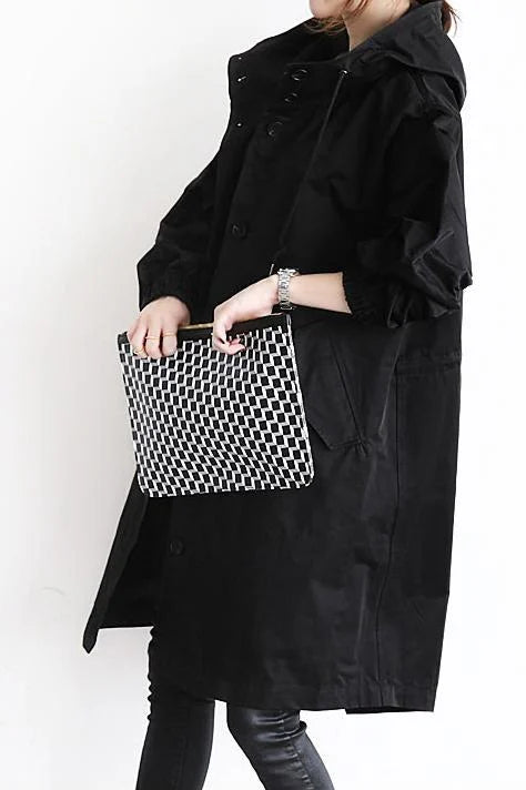 Trench coat oversize impermeable, un abrigo de moda mujer con caída relajada y un toque elegante.