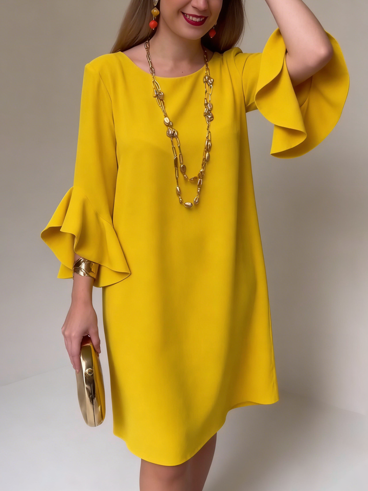 Vestido fluido de verano para mujer con manga volante, ideal para un look elegante y cómodo.