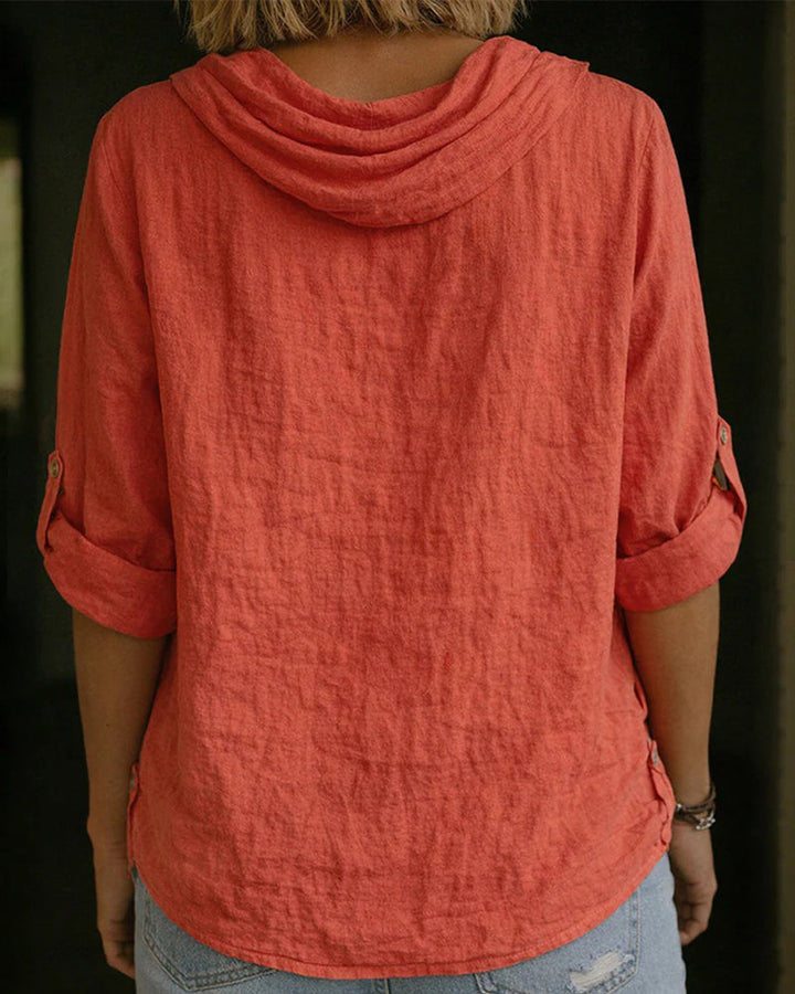 Blusa de mujer con cuello caído, tejido suave y ligero, perfecta para primavera y verano.