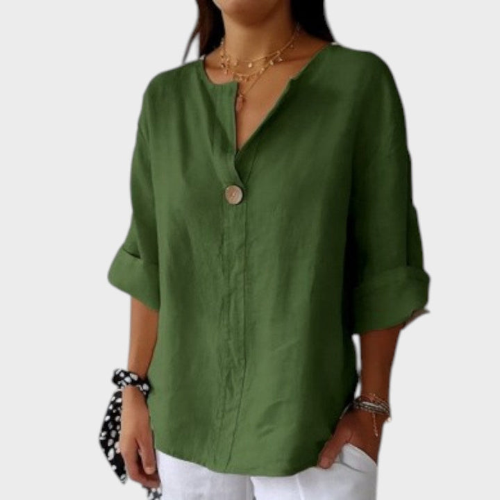 Blusa de lino para mujer, vista frontal. Escote V, corte holgado que favorece un estilo casual y elegante.
