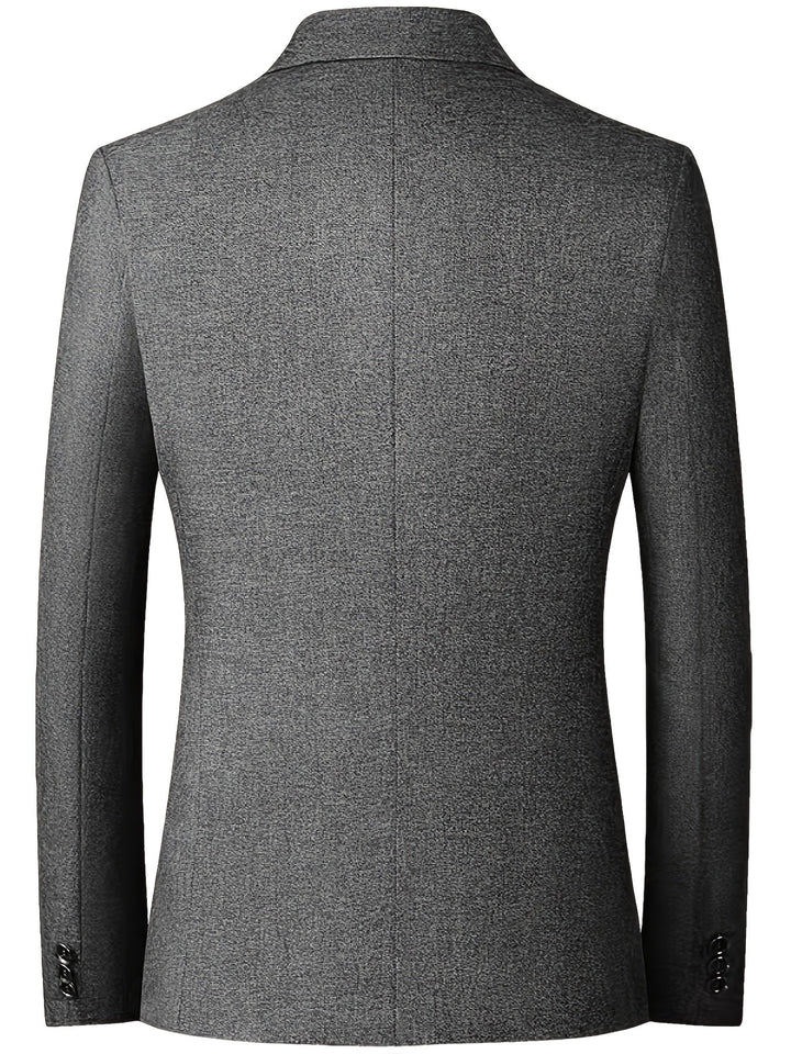 Blazer rojo para hombre, entallado, con dos botones. Chaqueta elegante que realza la moda masculina moderna.