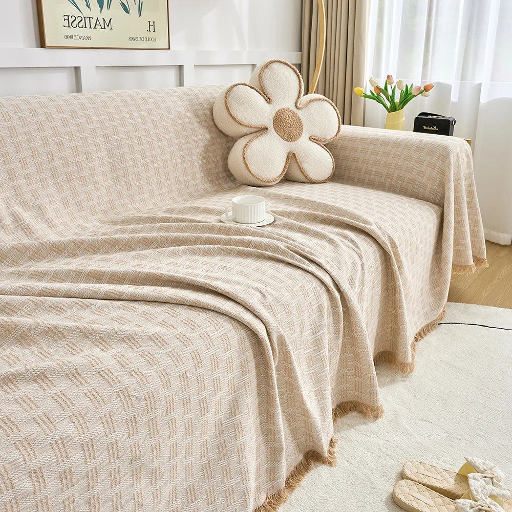 Funda de sofá fácil de colocar, protector reversible y lavable, ideal para renovar tus muebles de forma rápida.