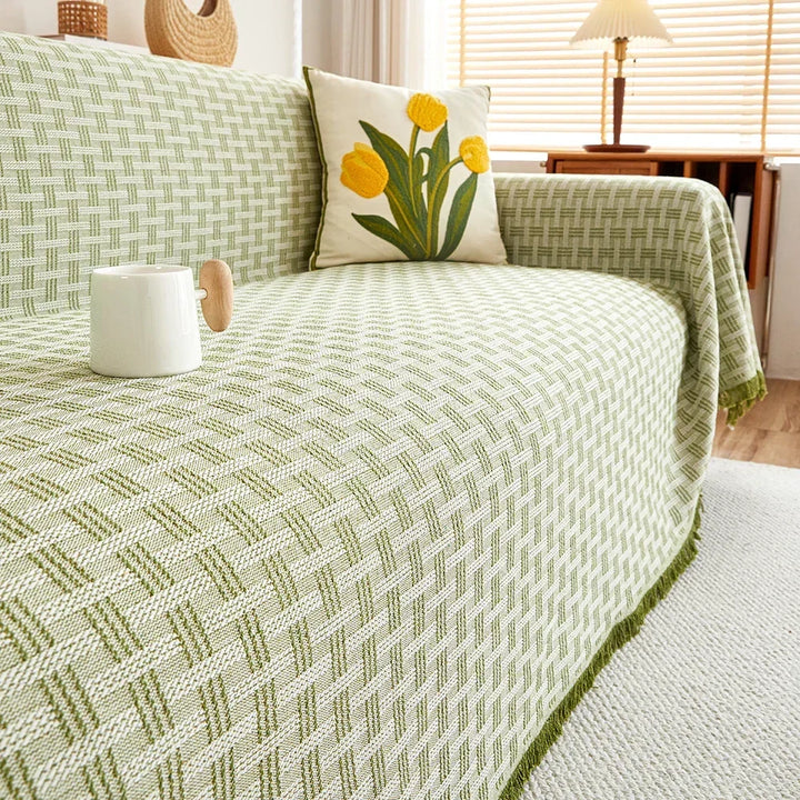 Funda protectora de sofá reversible beige/marrón, estilo y confort, cambia tu decoración de forma fácil.